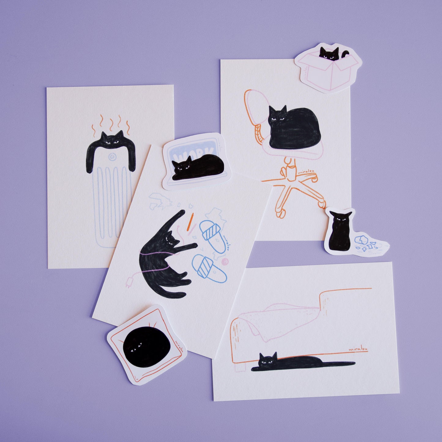 postcard and sticker set of playful illustrations of a black cat