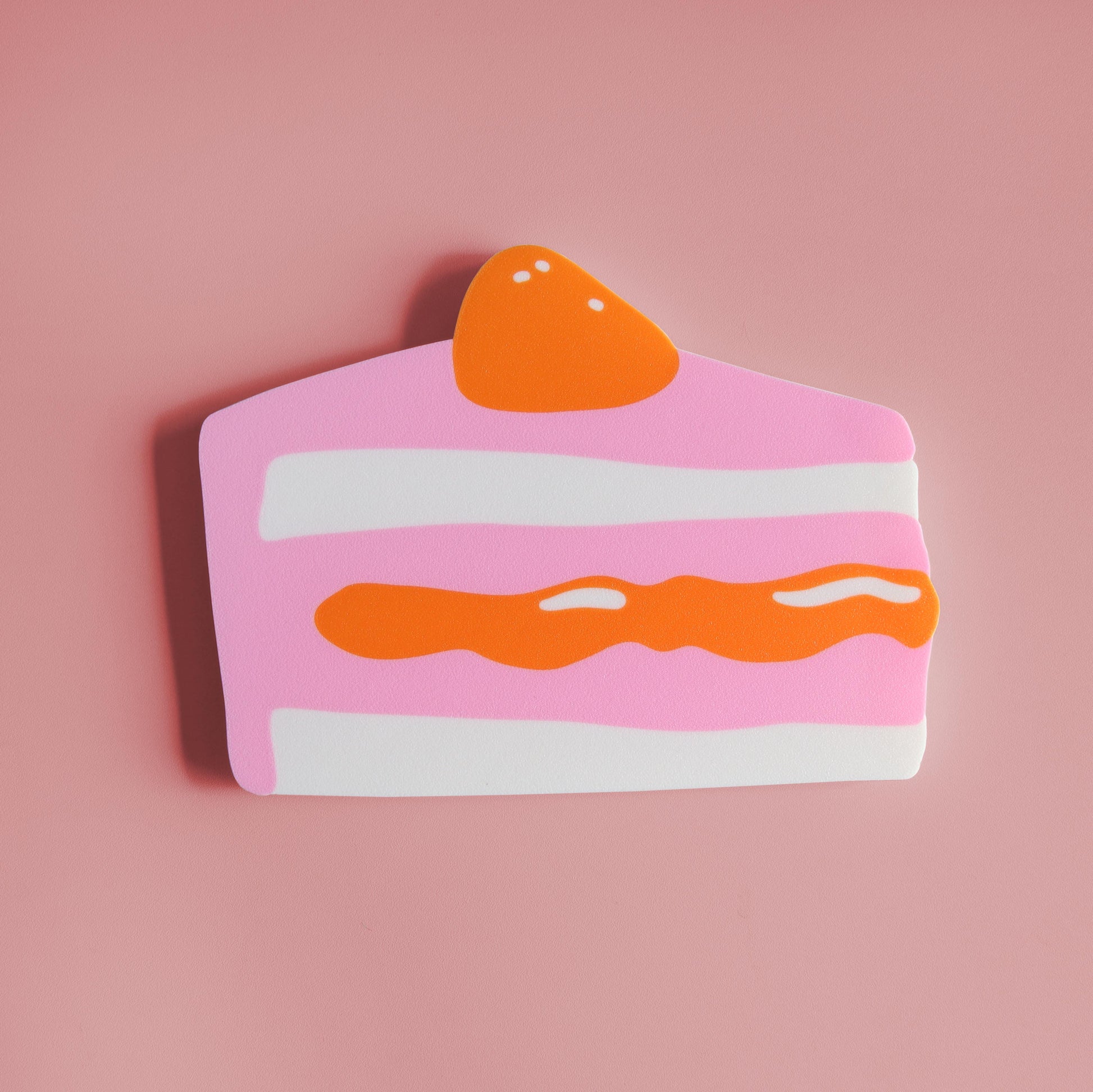 magnetic key holder in the shape of a piece of cake