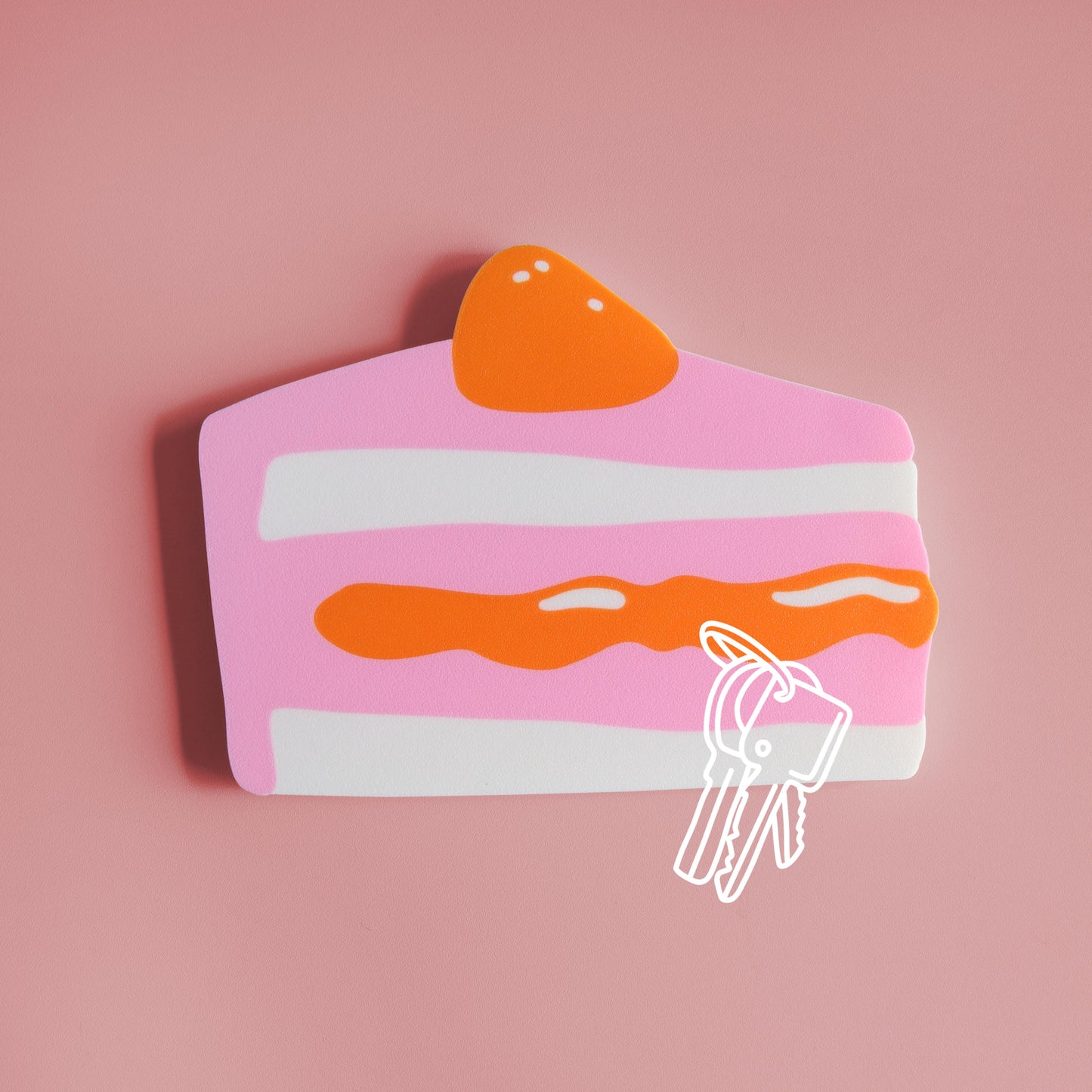 magnetic key holder in the shape of a piece of cake