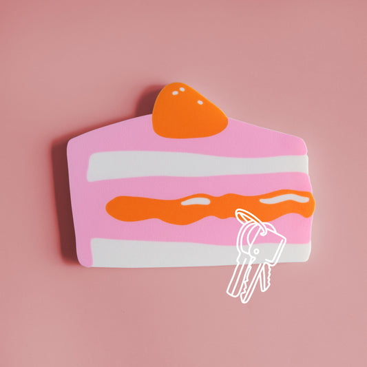 magnetic key holder in the shape of a piece of cake