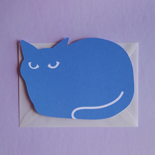 a postcard shaped like a cat on a transparent envelope