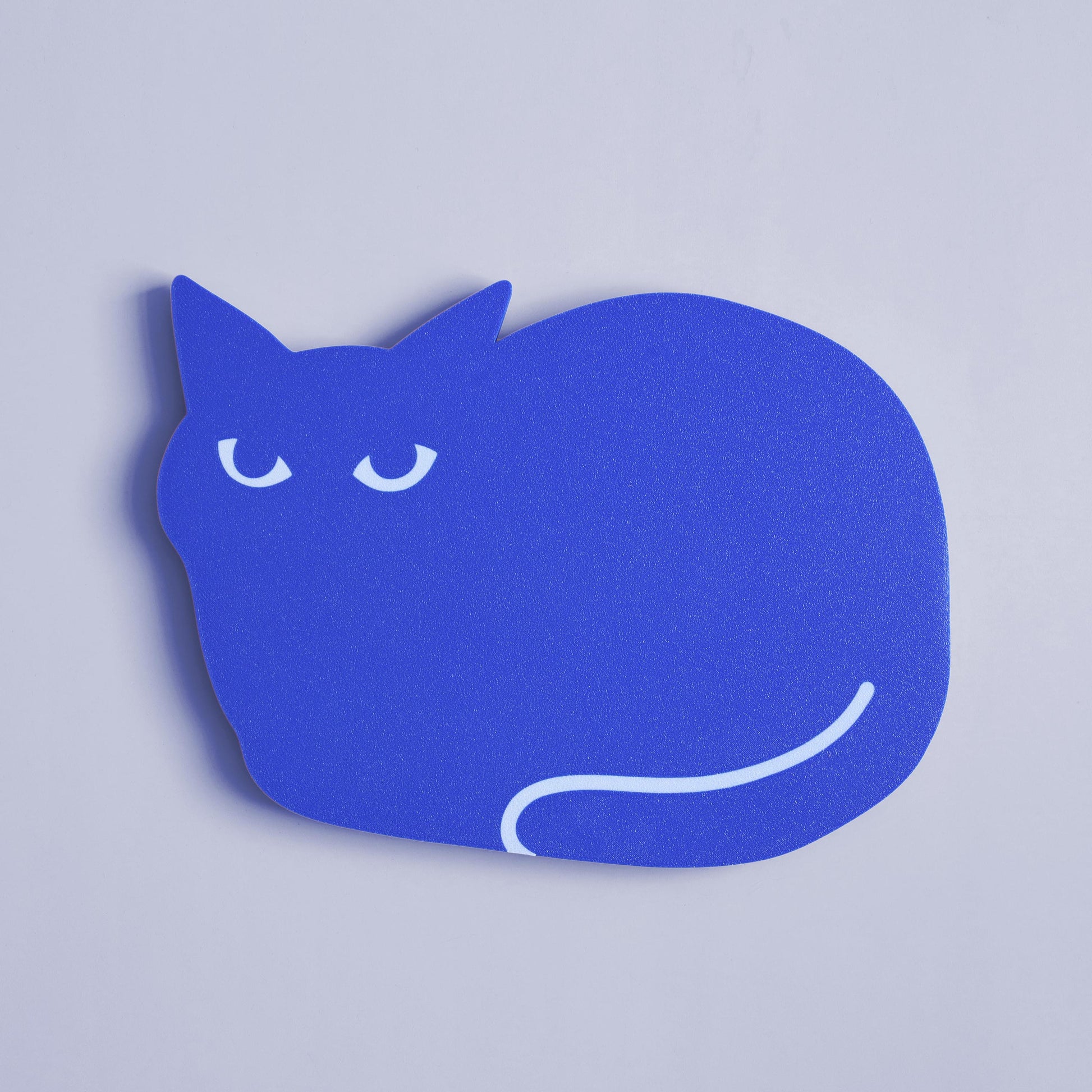 blue wall decor in the shape of a cat