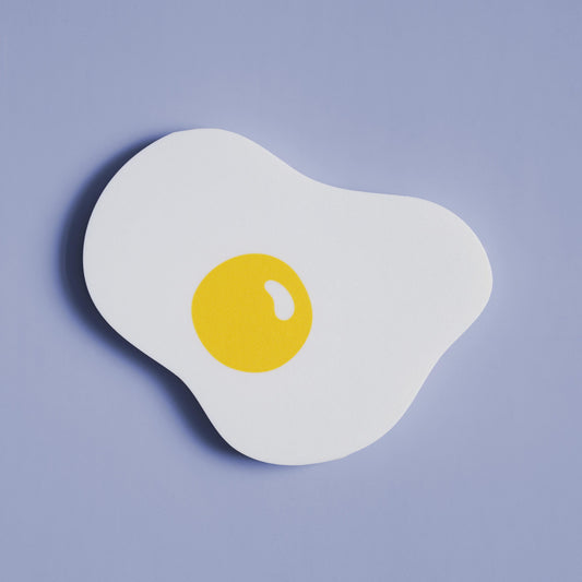 colorful wall decor in the shape of a fried egg