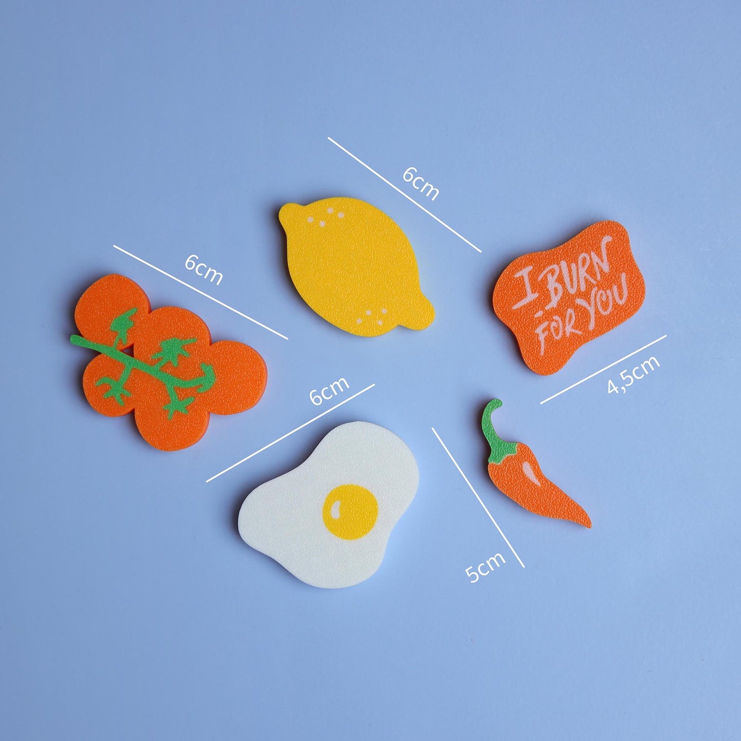 measurements of magnet set including lemon, tomatoes, egg, chili
