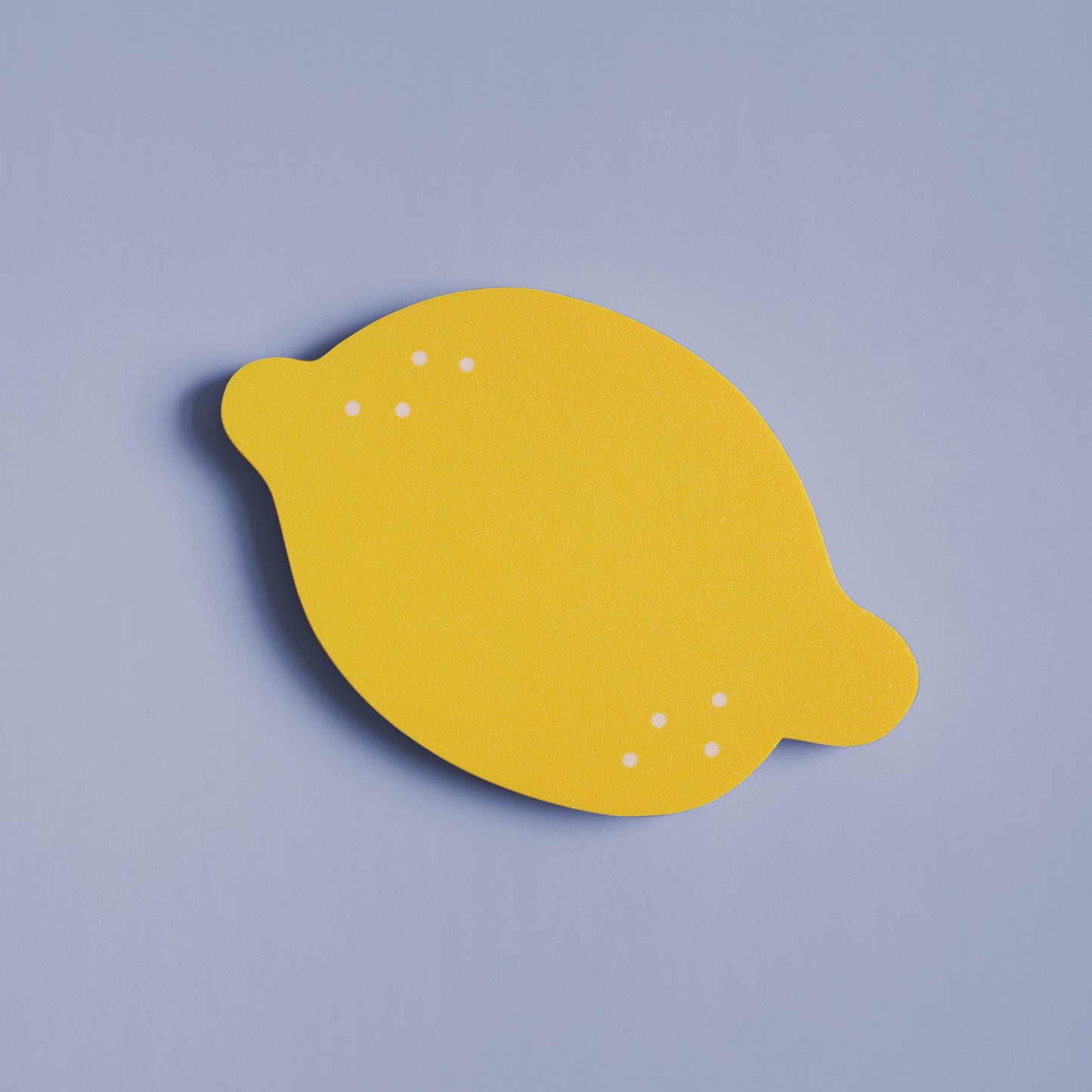 colorful wall decor in the shape of a lemon